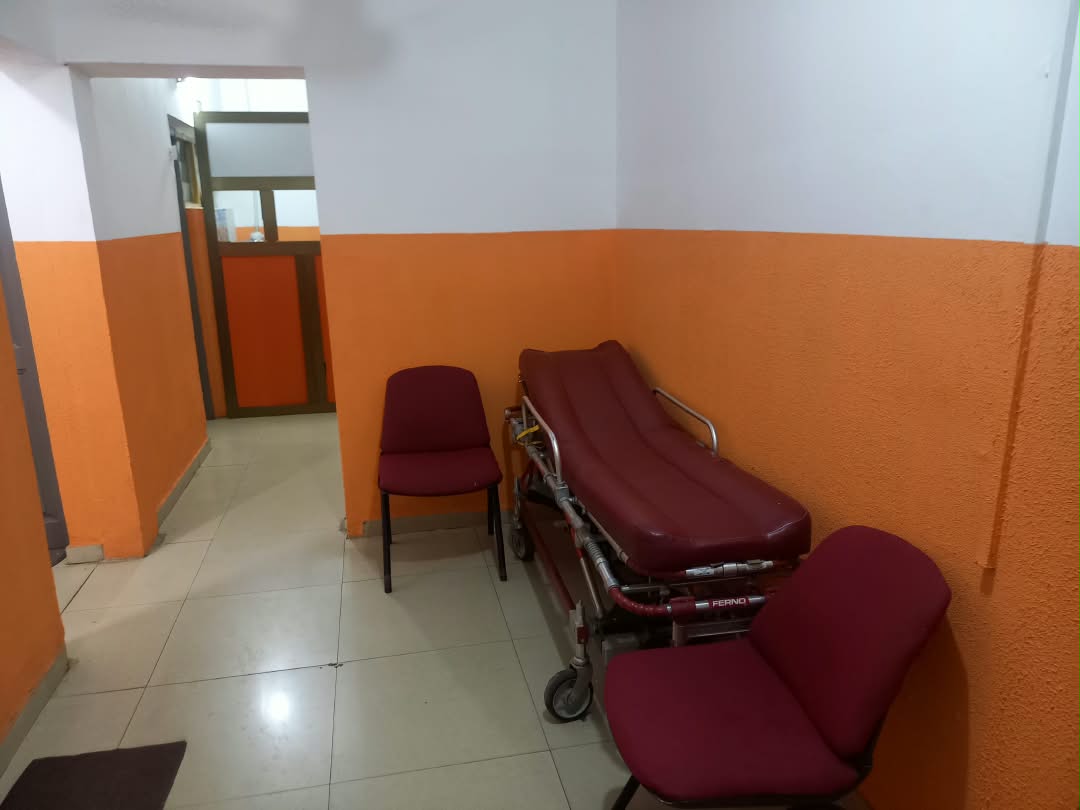 Patient corridor with seating and a stretcher